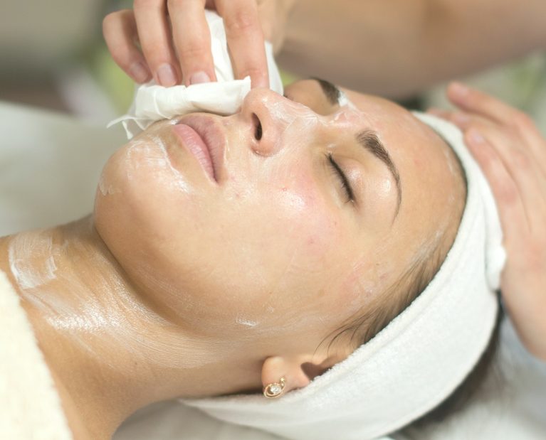 Facial cleansing at skin care spa